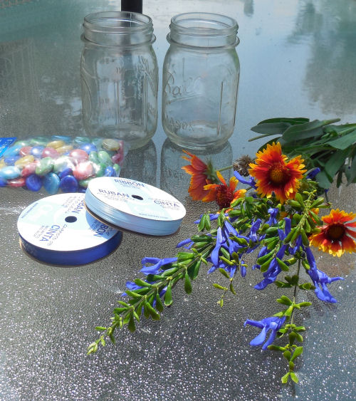 Pretty glass jar lanterns with pressed flowers - How to make