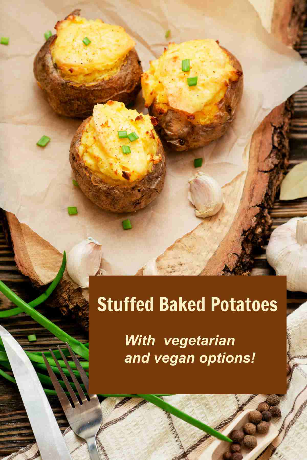 Healthy baked potatoes with vegetarian cheese, chives and garlic.