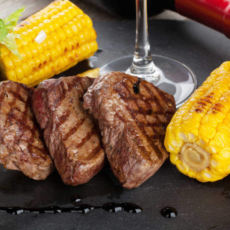 Montreal steak recipe with grilled corn.
