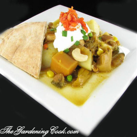 Vegetable tikka masala with beans, and Naan bread.