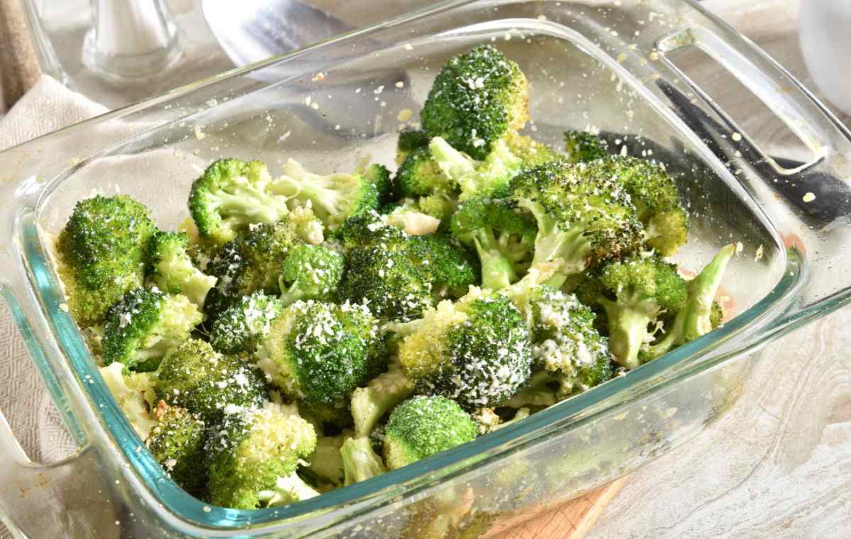 Casserole with broccoli and grated cheese.