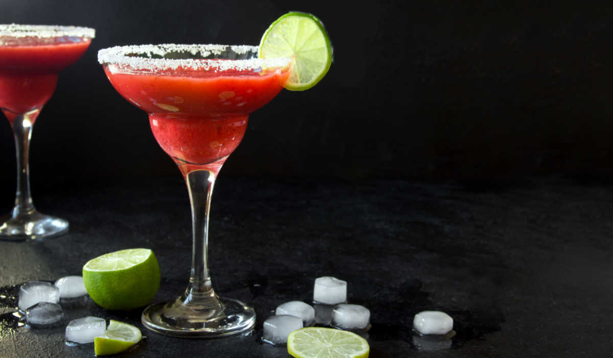 Frozen strawberry daiquiri with salt and lime and ice.