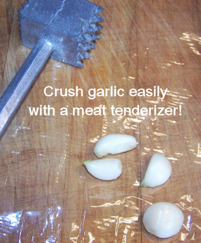 Easily crush garlic with a meat tenderizer