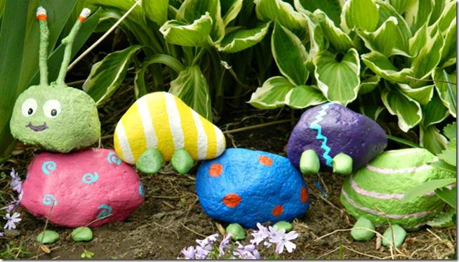 Rocks painted to look like a caterpillar.