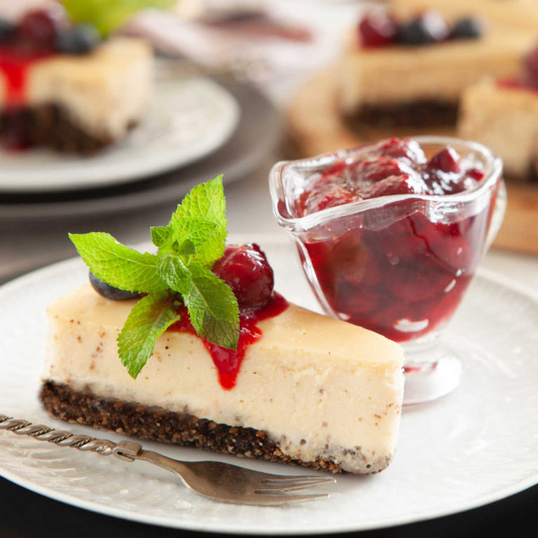 Cheesecake with cherry topping and chocolate crust.