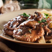 Chicken with mushrooms in a wine sauce.