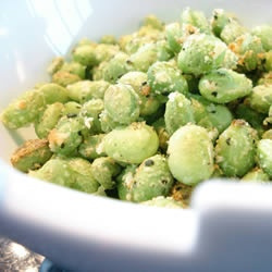 Crispy edamame in a white bowl.
