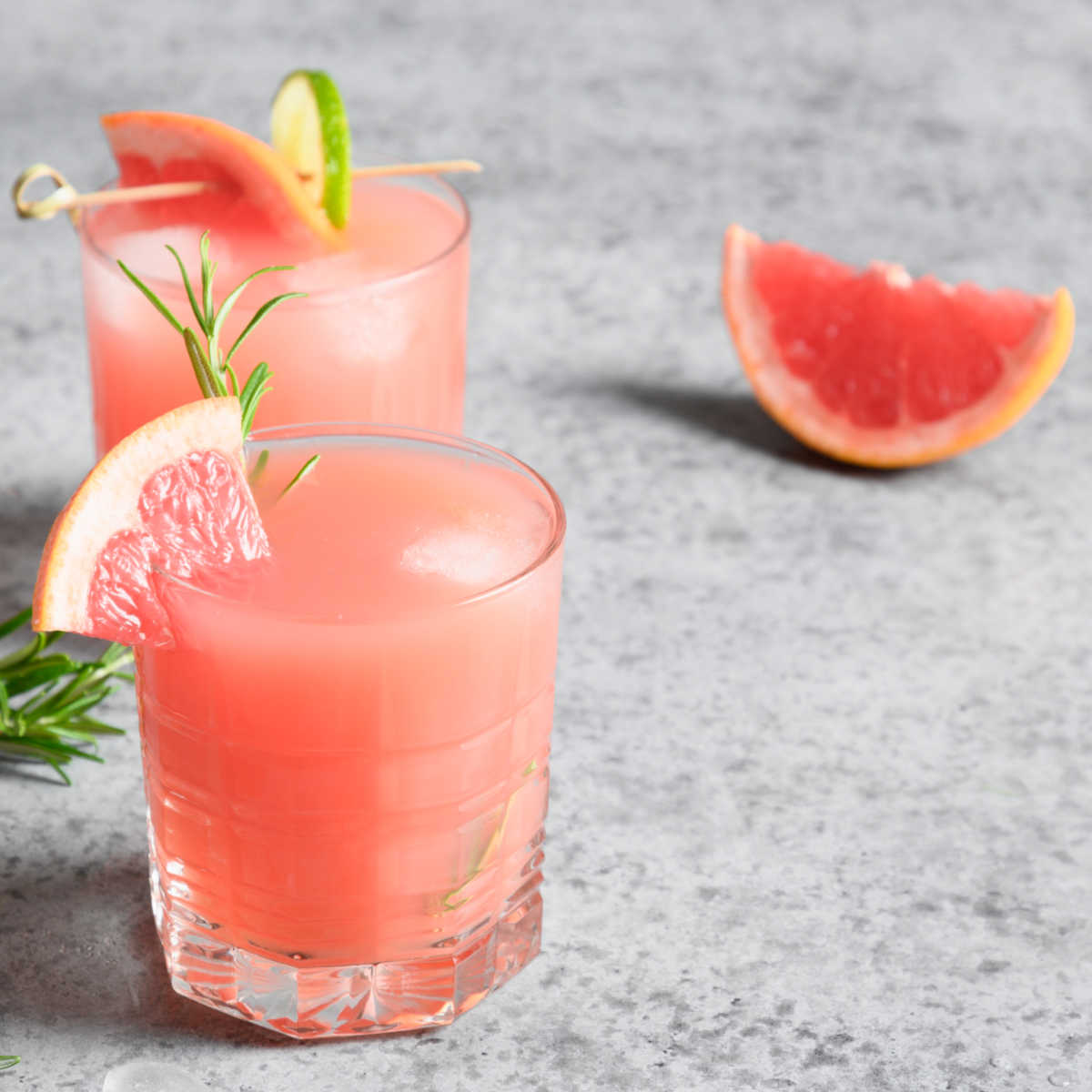Grapefruit drink with lime and rosemary