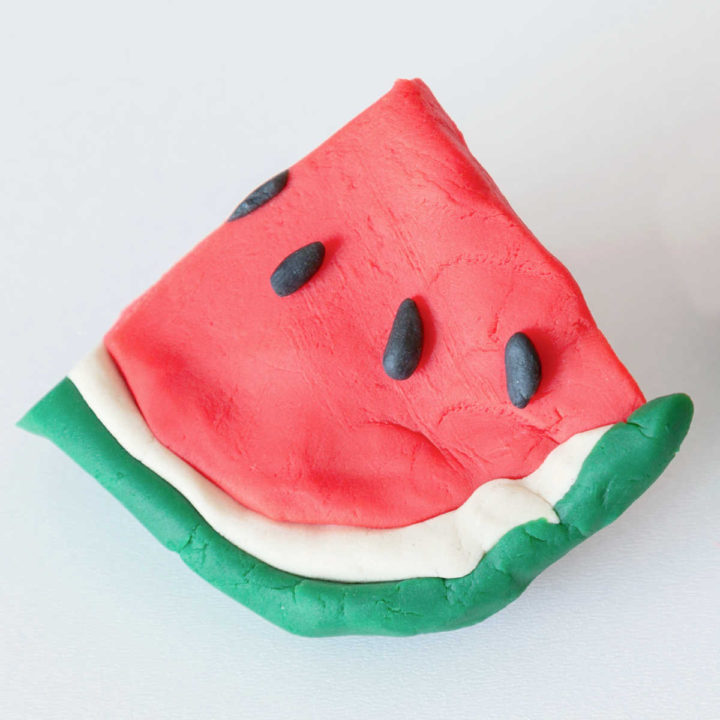 Playdoh made into watermelon shapes.