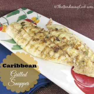 This recipe for Caribbean snapper was cooked on a campfire safe fish griller and tastes delicious. Get the recipe at thegardeningcook.com