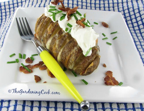 Top with sour cream bacon and chives
