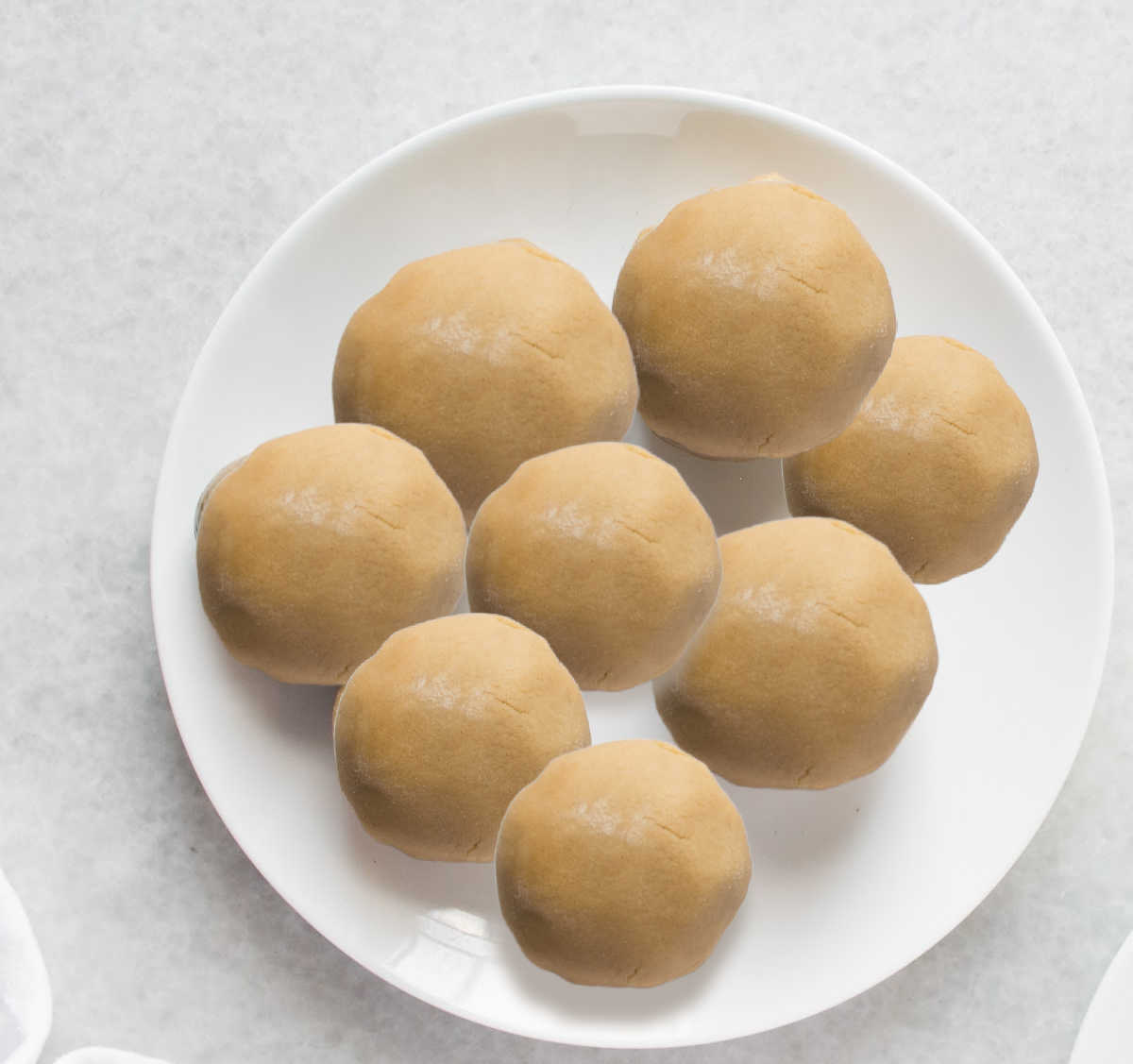 Brigadeiro batter formed into balls.