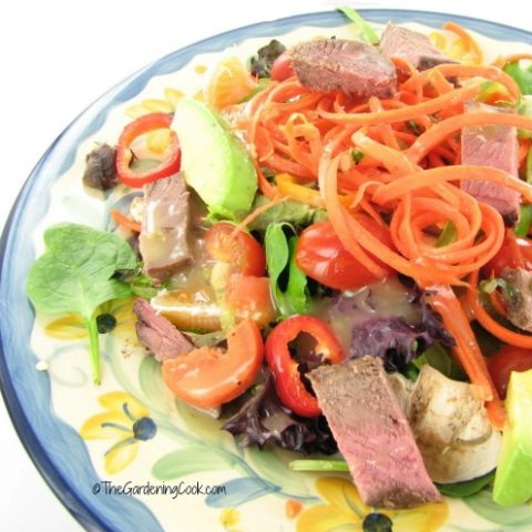 Beef veggie salad with pear gorgonzola dressing.