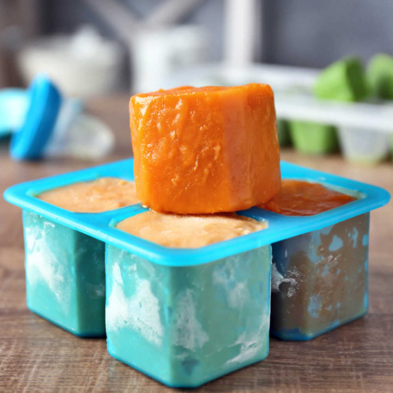 Frozen sauce in a large silicone ice cube tray.