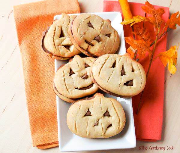 Cute Halloween Pumpkin cookies on a plate.