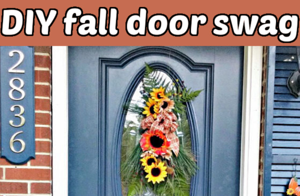 A blue front door with a glass panel decorated with a autumn wreath. Brown text box reads DIY fall door swag.
