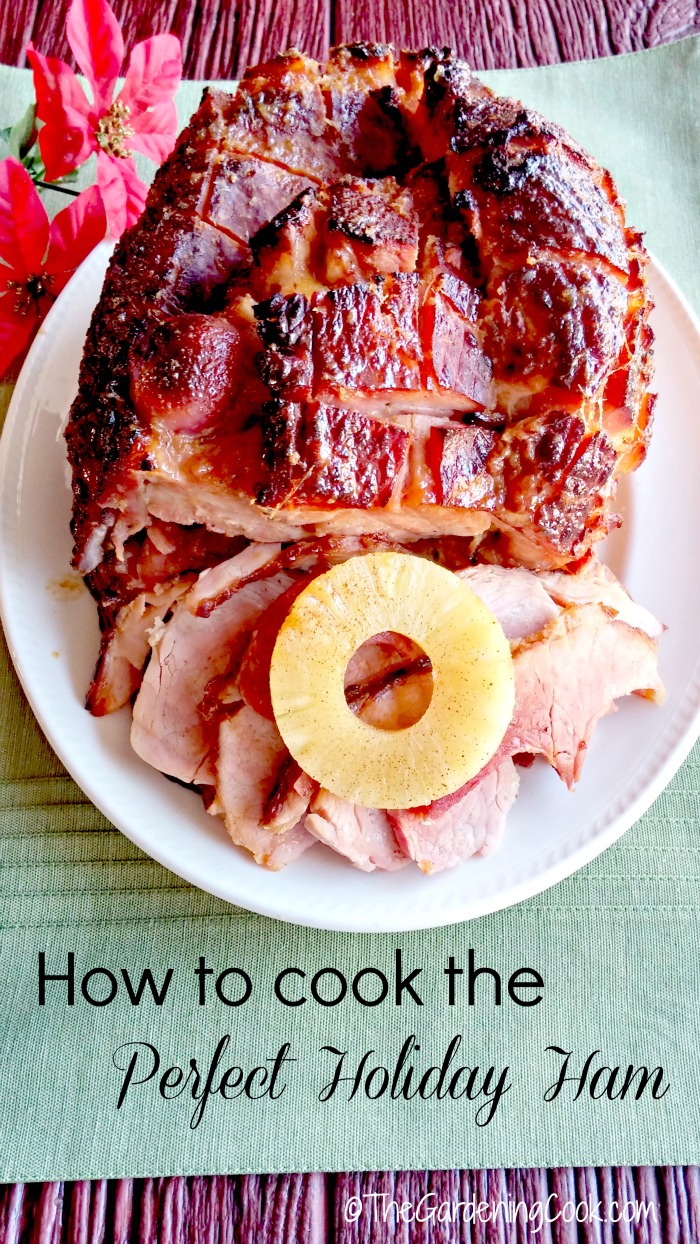 Spiral ham on a plate with text reading How to cook the perfect holiday ham.