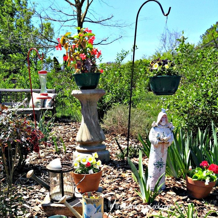 recyclled bird bath becomes garden planter