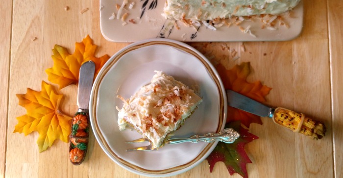 This pumpkin cake is moist and delicious and has a crunchy toasted coconut frosting.