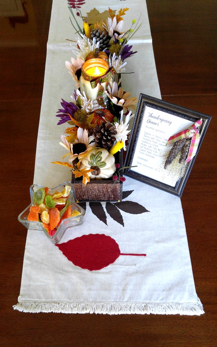 This Thanksgiving Centerpiece makes use of reclaimed wood and inexpensive craft supplies and looks lovely on a long dining room table. It is very easy to make, in just a few hours.