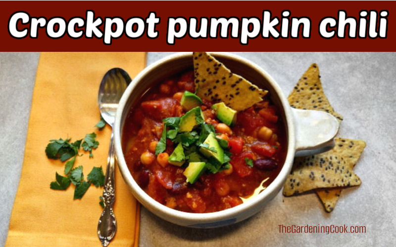 Crockpot pumpkin chili Fall chili in a bowl next to a yellow napkig and tortilla chips. Brown text box reads crockpot pumpkin chili.