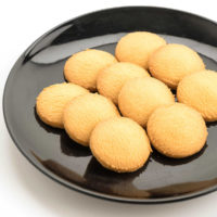 Shortbread cookies on a black plate
