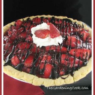 Easy Strawberry pie with chocolate drizzle and whip cream