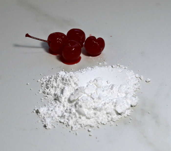 Maraschino cherries and confectioner's sugra