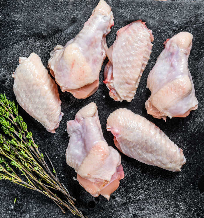 Split chicken wings with fresh thyme