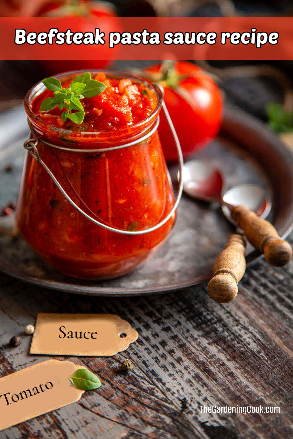 How to Make Pasta Sauce with Beefsteak Tomatoes Beefsteak Pasta Sauce in small jars with spoons.