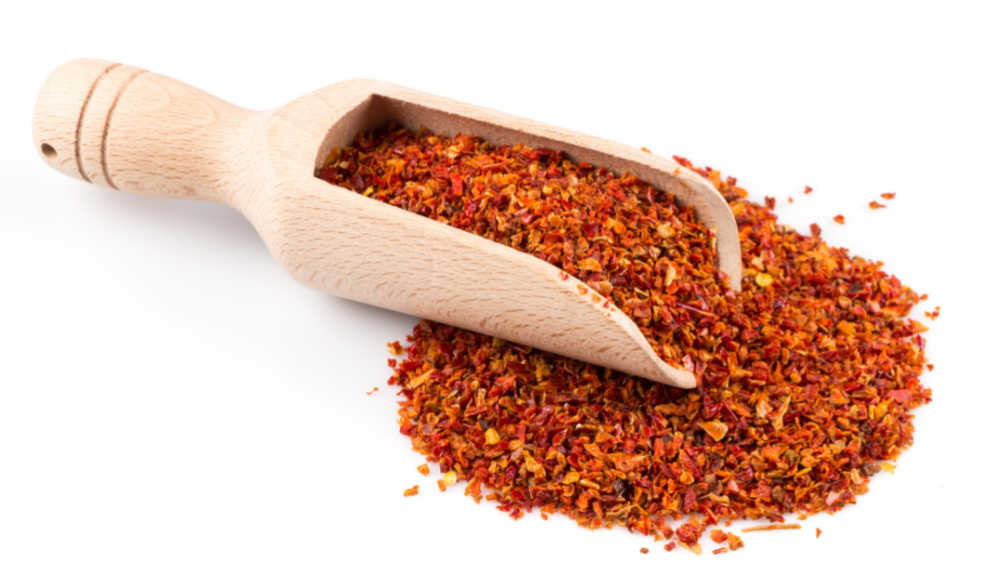 Scoop with crushed red pepper.