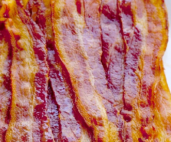 Strips of cooked bacon.