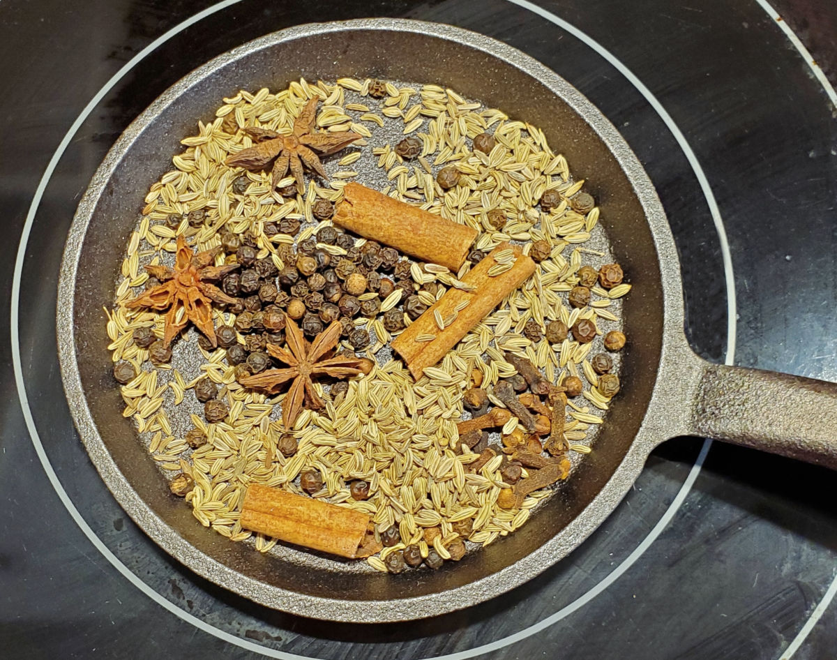 Place the star anise, cinnamon pieces, fennel seeds, peppercorns, and cloves in a dry skillet. Toast over a medium-low heat for 2-3 minutes. Stir constantly until fragrant. Remove immediately to prevent burning. Watch the cloves carefully since they darken faster than the other spices. If they darken too quickly, remove the pan from the heat. Allow the spices to cool completely. Transfer the toasted spices to a spice grinder, coffee grinder, or mortar and pestle. Grind them into a fine powder. Store the Chinese five spice in an airtight jar.